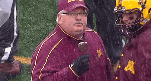 minnesota-coach-eating-a-dilly-bar-in-snow